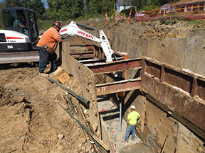 c-2 screw piling within shoring