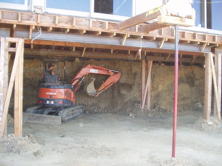 Excavation underneath house for underpinning and new basement