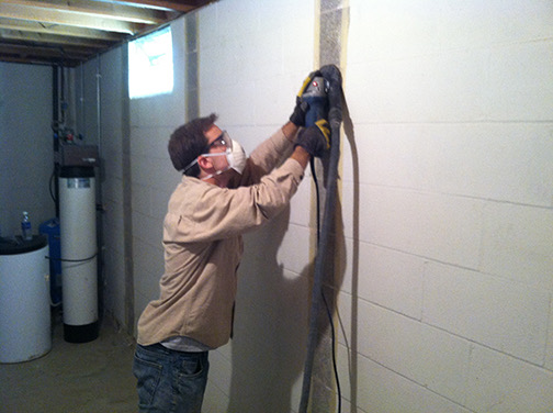 fortress 2B grinder is equipped with a shroud connected to a shop-vac to control excess dust