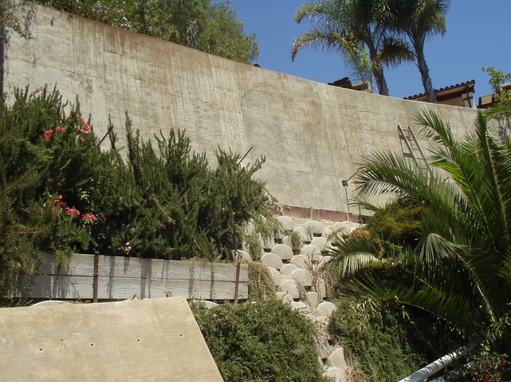 New Retaining Wall with Gewi Piles and Dywidag Tiebacks before vegetation growth