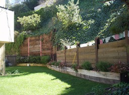 Wood Retaining Wall with Soldier Piles and Tiebacks
